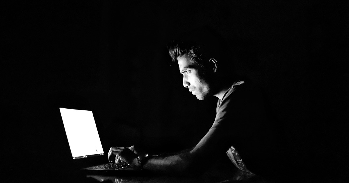 hacker at a laptop