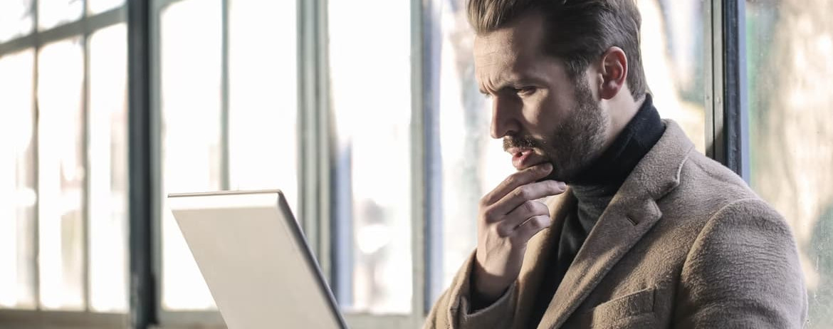 gentleman uses laptop