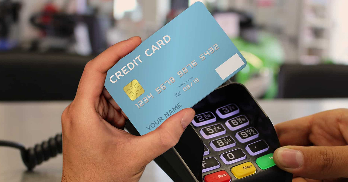 person using credit card machine