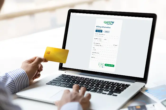 QPay displayed on laptop