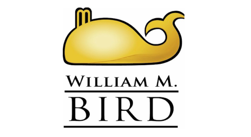 Gold whale logo displaying William R. Bird at the bottom